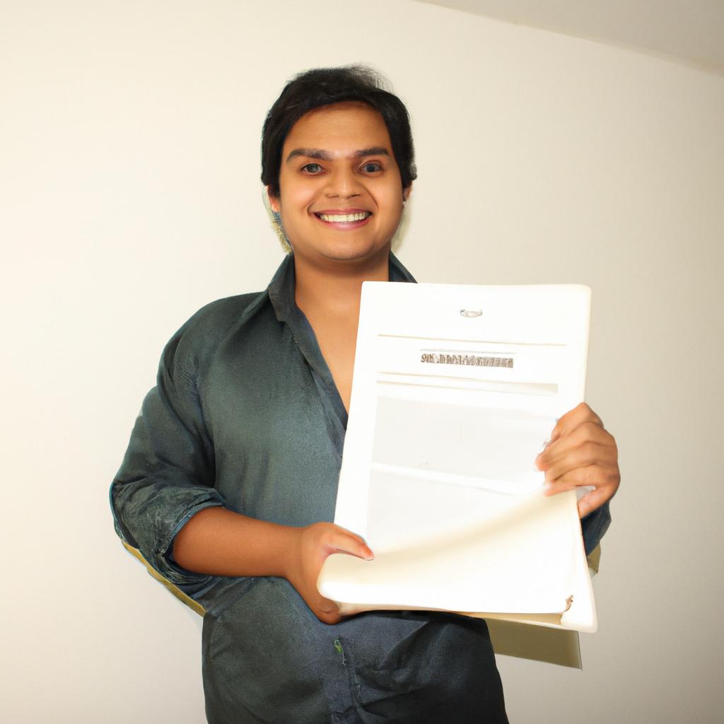 Person holding legal document, smiling