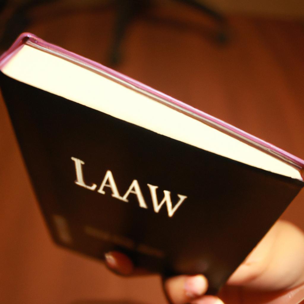 Person holding a law book